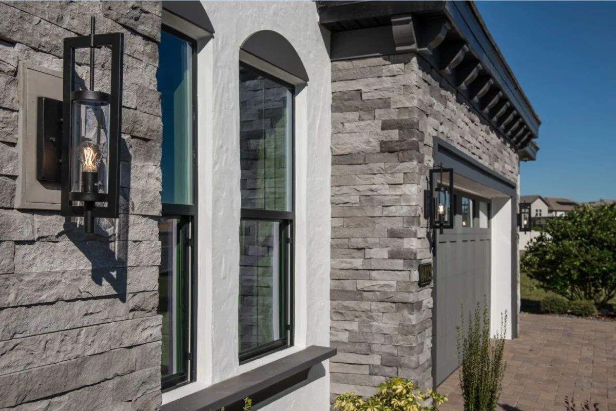 ES_LedgeCut33_Beach-Pebble_reNEWable-Home_Exterior_Progress-Lighting_1
